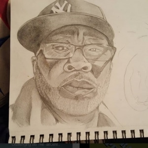 Artist drawwing male with hat and glasses